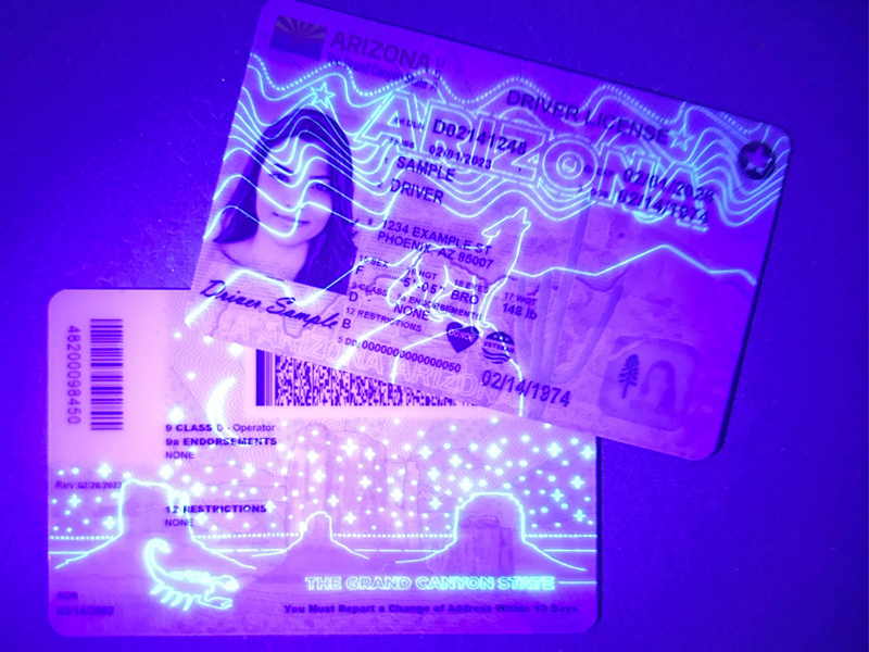UV reactive fluorescent patterns on 2026 novelty ID under blacklight
