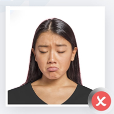 Incorrect facial expression for ID photo